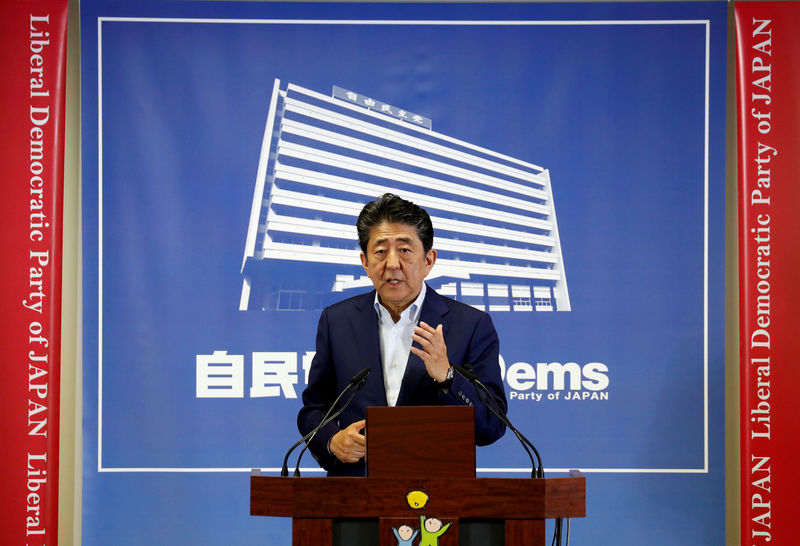 Japan's Abe vows flexible steps in case of downside economic risks