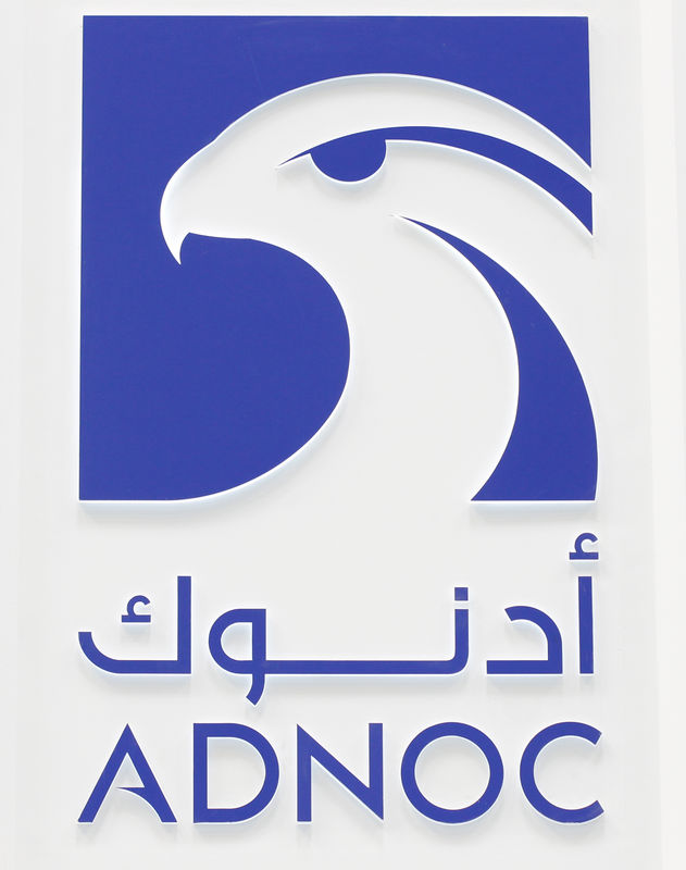 © Reuters. FILE PHOTO: Logo of ADNOC is seen at the 20th Middle East Oil & Gas Show and Conference (MOES 2017) in Manama