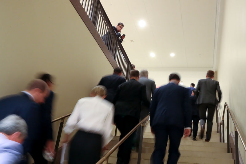 © Reuters. Members of the U.S. House Republican caucus ascend a stairway at the U.S. Capitol Visitor Center in Washington