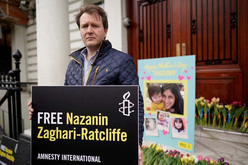 © Reuters. FILE PHOTO: Richard Ratcliffe, husband of British-Iranian dual national Nazanin Zaghari-Ratcliffe, poses for a photograph after delivering a Mother's Day card and flowers to the Iranian Embassy in London