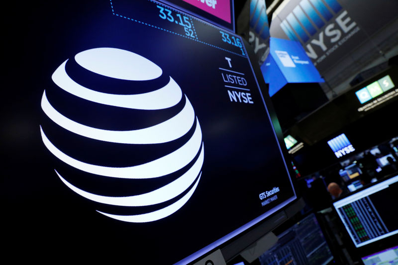 © Reuters. The AT&T logo is seen on a monitor on the floor of the New York Stock Exchange (NYSE)