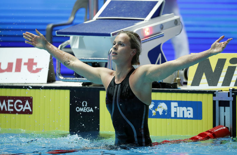 Hungarian teen smashes Phelps record, Peaty does double