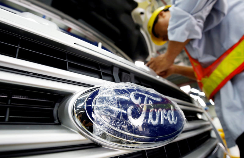 Ford second-quarter profit falls on restructuring charges