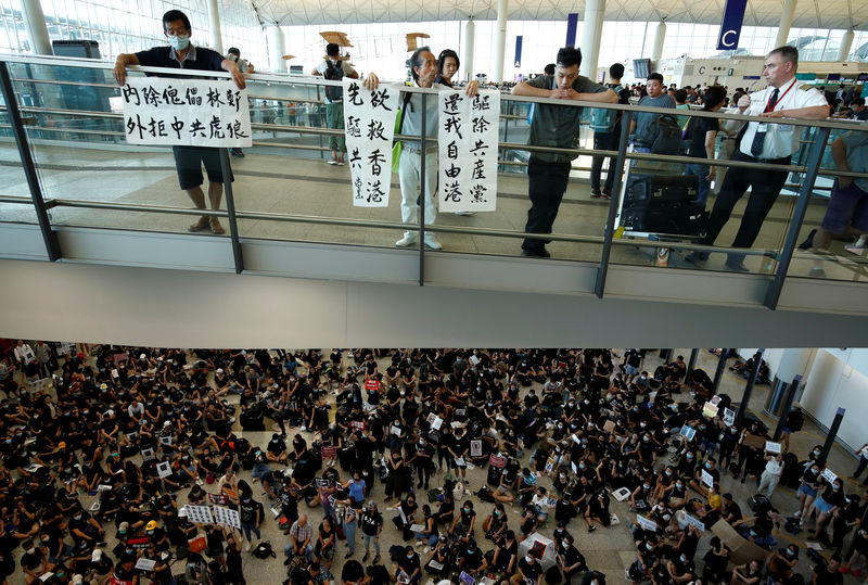 © Reuters. Protest against the recent violence in Yuen Long, at Hong Kong airport