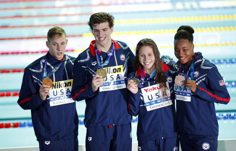 Swimming U.S. set world record, win mixed 4x100m freestyle relay gold