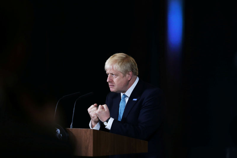 © Reuters. Britain's Prime Minister Boris Johnson gestures during a speech on domestic priorities at the Science and Industry Museum in Manchester