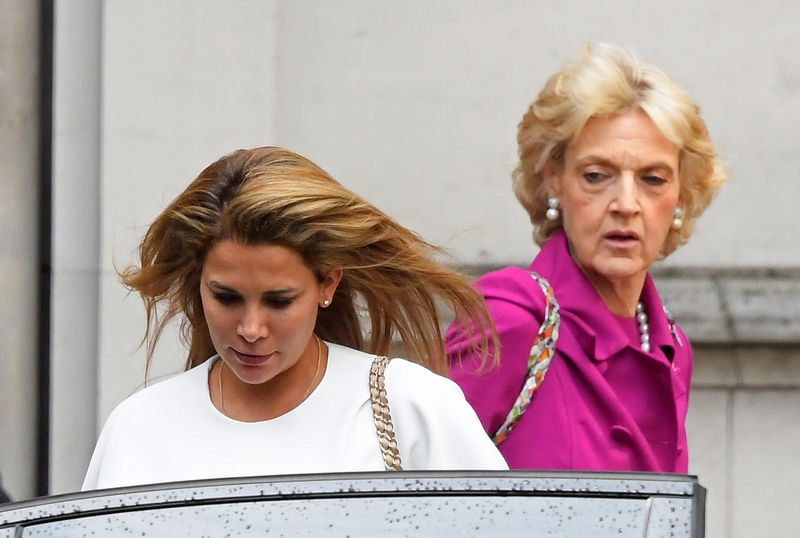 © Reuters. Princess Haya bint Al Hussein, the wife of Dubai's Sheikh Mohammed bin Rashid Al Maktoum, is seen with lawyer Baroness Fiona Shackleton leaving The Royal Courts of Justice in London