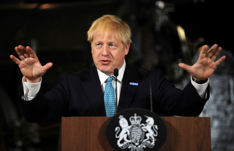 © Reuters. Britain's Prime Minister Boris Johnson gestures during a speech on domestic priorities at the Science and Industry Museum in Manchester