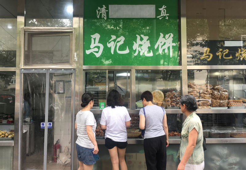 بكين تأمر مطاعم الأكل الحلال بإزالة الكتابات العربية والرموز الإسلامية