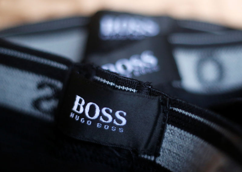 © Reuters. FILE PHOTO: The logo of German fashion house Hugo Boss is seen on a clothing label at their outlet store in Mezingen near Stuttgart