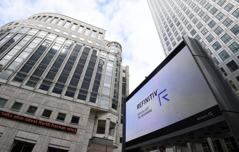 © Reuters. The Refinitiv logo is seen on a large screen in Canary Wharf in London