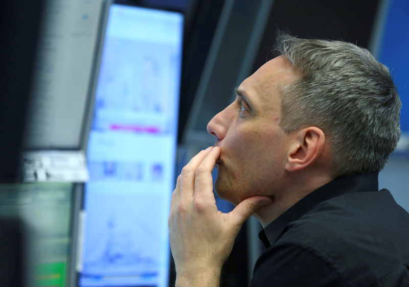 © Reuters. FILE PHOTO: A trader works at Frankfurt's stock exchange in Frankfurt