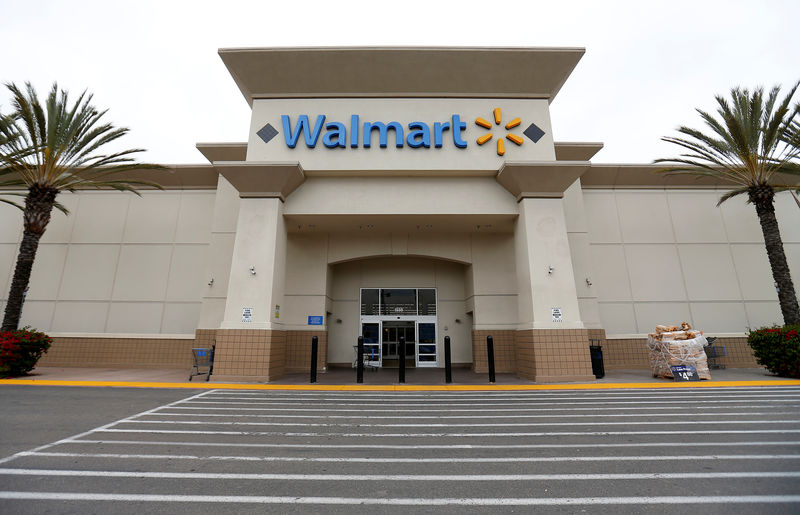 © Reuters. The logo of Down Jones Industrial Average stock market index listed company Walmart