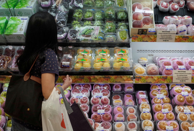 Japan's June household spending firm but real wages cloud outlook