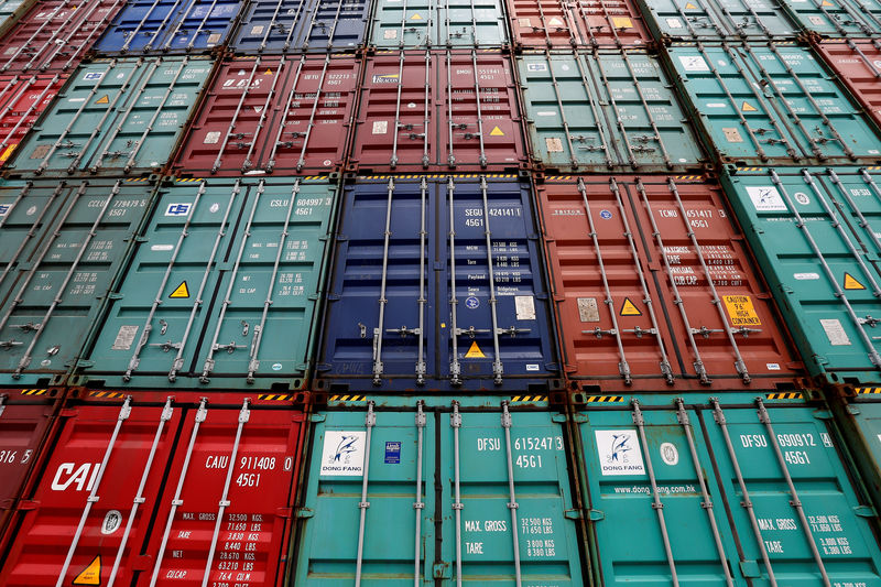 © Reuters. FILE PHOTO: A stack of shipping containers are pictured in the Port of Miami in Miami
