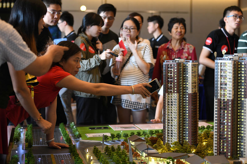 China's builders brace for winter: buy less land as home sales weaken