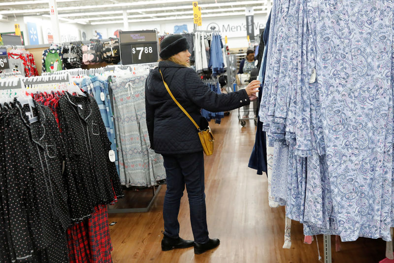 © Reuters. A woman shops at a Walmart in Westbury, New York