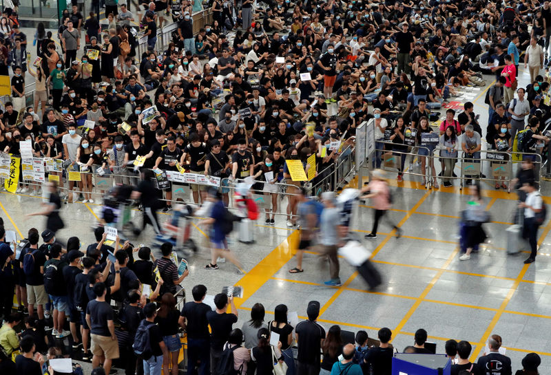 Hong Kong police fire tear gas during cat-and-mouse encounters