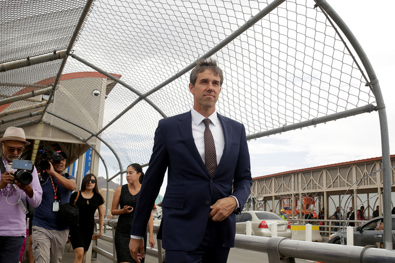 © Reuters. Democratic presidential candidate Beto O'Rourke crosses the Paso del Norte International border bridge to attend the funeral services of a victim of a mass shooting in El Paso, Texas, as seen from Ciudad Juarez