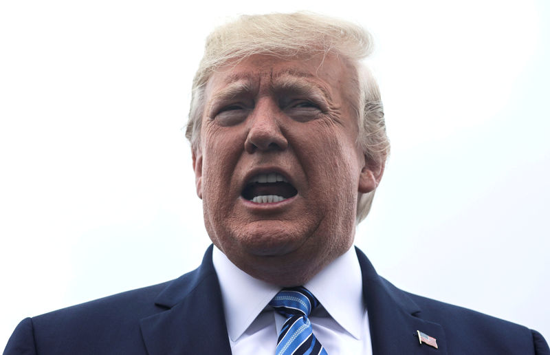 © Reuters. FILE PHOTO: FILE PHOTO: U.S. President Trump talks to reporters as he boards Air Force One for travel to Pennsylvania from Morristown Municipal Airport in Morristown, New Jersey