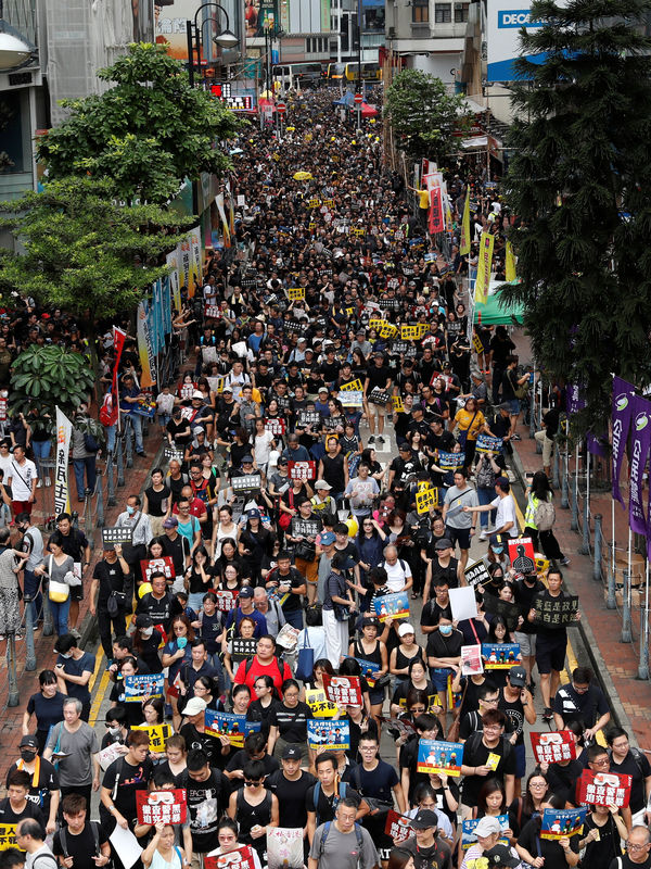 Thousands of Hong Kongers brave rain to join anti-government rally