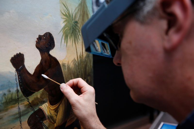 British conservationists work to restore acclaimed slavery painting