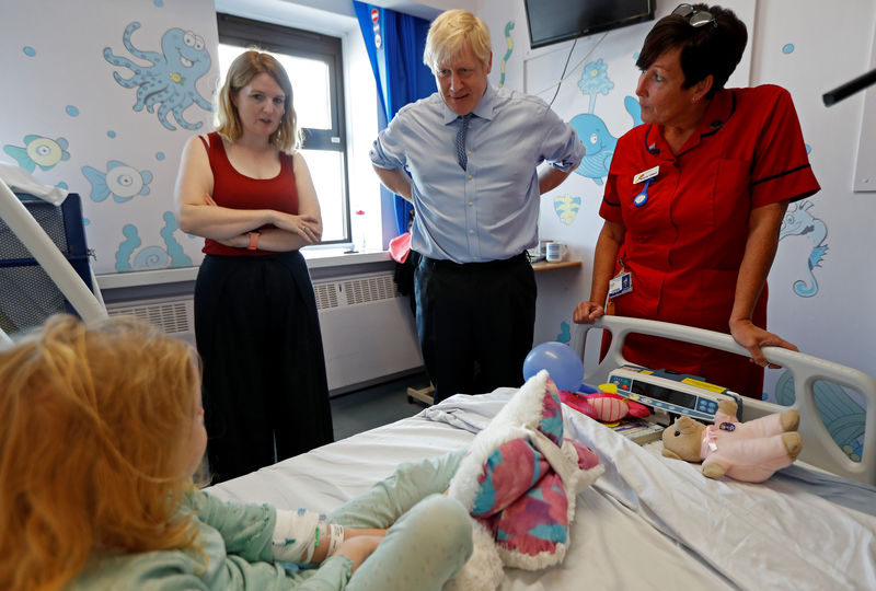 © Reuters. Britain's PM Johnson visits the Royal Cornwall Hospital in Truro