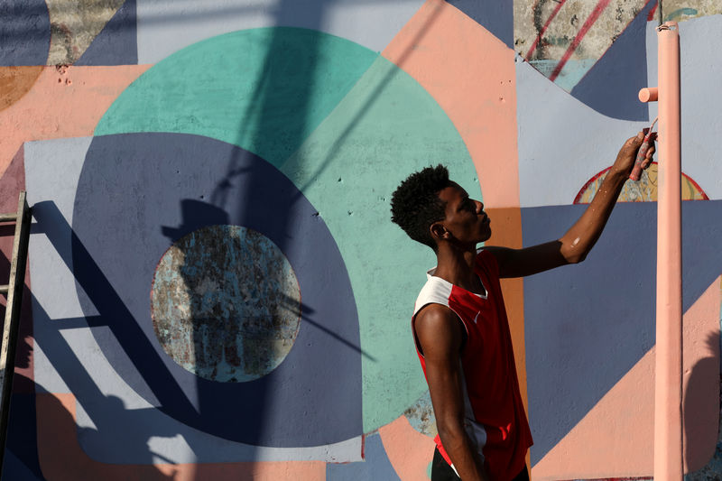 El arte callejero se instala en un barrio caraqueño conocido por su violencia