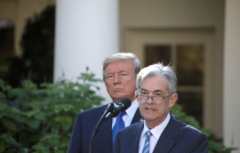 © Reuters. FILE PHOTO: FILE PHOTO: U.S. President Donald Trump looks on as Jerome Powell, his nominee to become chairman of the U.S. Federal Reserve, speaks at the White House in Washington