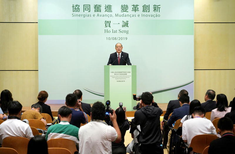 © Reuters. FILE PHOTO: Ho Iat Seng, the candidate for Macau chief executive, speaks at a news conference in Macau