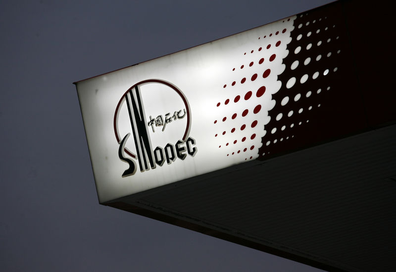 Caught in tariff war, Sinopec seeks waiver for imported U.S. oil - sources