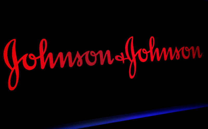 © Reuters. FILE PHOTO: The Johnson & Johnson logo is displayed on a screen on the floor of the NYSE in New York