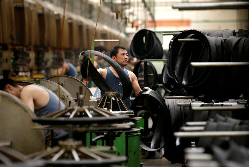 China's July industrial profits swing to growth but outlook clouded