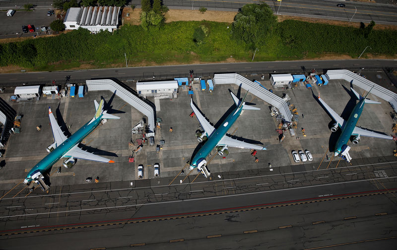 © Reuters. Unpainted Boeing 737 MAX aircraft are seen parked at Renton Municipal Airport in Renton