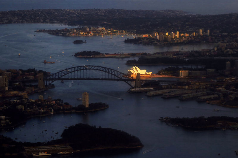 Australia's economy slows to decade low, government spurns stimulus