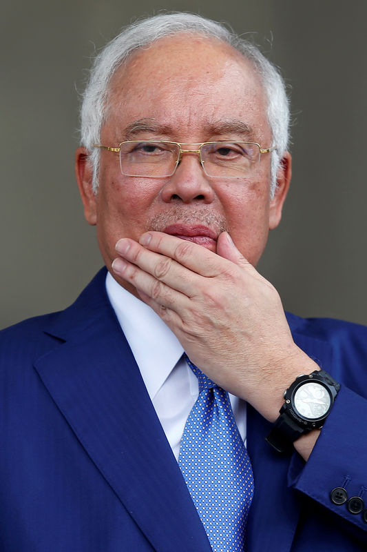 © Reuters. Former Malaysian Prime Minister Najib Razak leaves Kuala Lumpur High Court in Kuala Lumpur