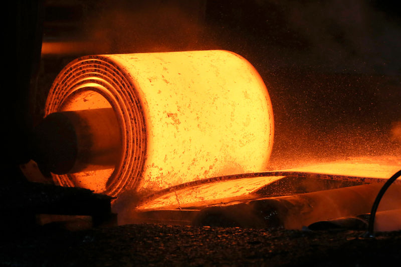 © Reuters. A steel coil is unrolled on the line at the Novolipetsk Steel PAO steel mill in Farrell, Pennsylvania