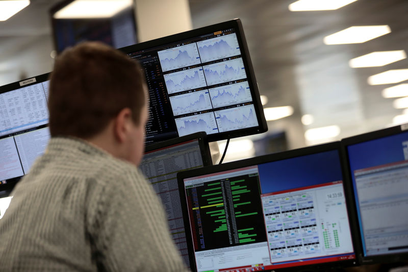 Stocks trading ex-dividend knock FTSE 100 lower; industrials rise