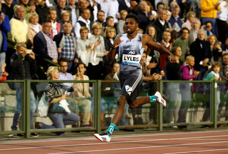 Lyles completes sprint double before world championships