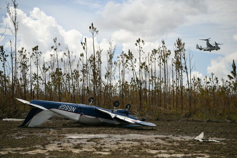 © Reuters. An overturned airplane is seen near the airport in the wake of Hurricane Dorian in Marsh Harbour