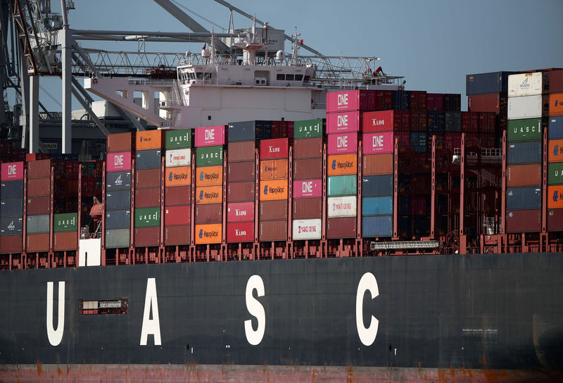 © Reuters. FILE PHOTO: Shipping containers stacked on a cargo ship are seen in the dock at the ABP port in Southampton