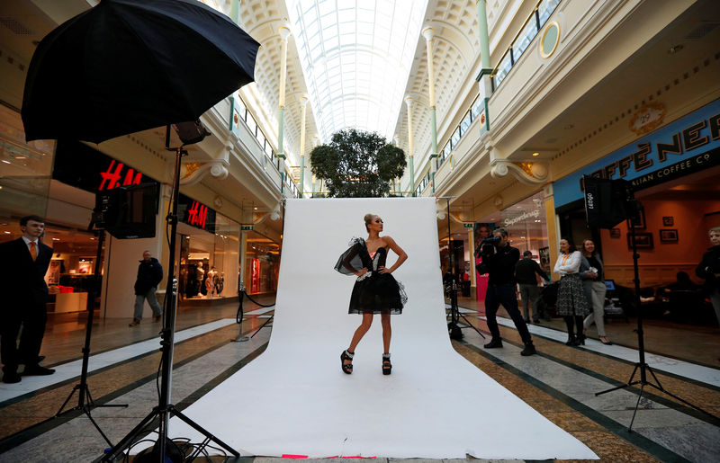 © Reuters. FILE PHOTO: Model Bethan Sowerby wears a dress made using graphene during a media event at the Intu Trafford centre shopping complex in Manchester, Britain