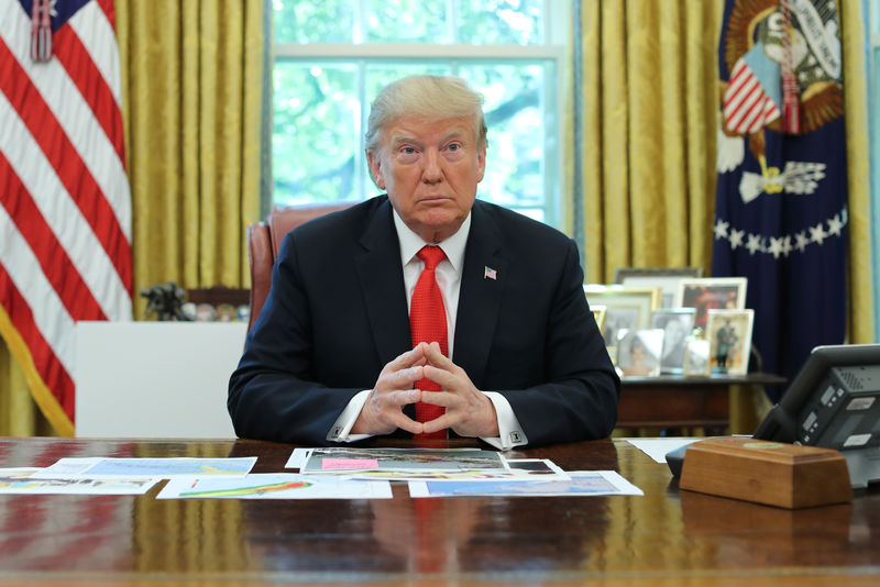 © Reuters. FILE PHOTO - U.S. President Trump receives a Hurricane Dorian update at the White House in Washington