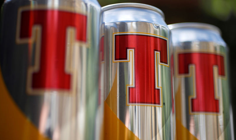 © Reuters. FILE PHOTO: Cans of Tennent's Lager are displayed in a shop in Edinburgh, Scotland