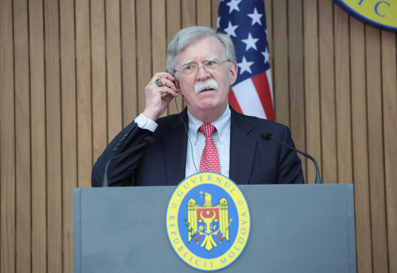 © Reuters. U.S. National Security Advisor Bolton attends a news conference in Chisinau