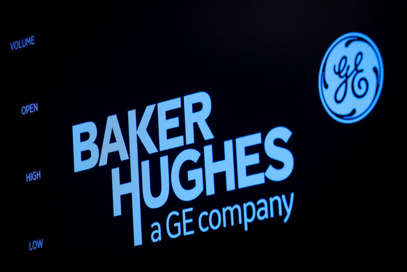 © Reuters. A screen displays the logo for Baker Hughes on the floor at the NYSE in New York