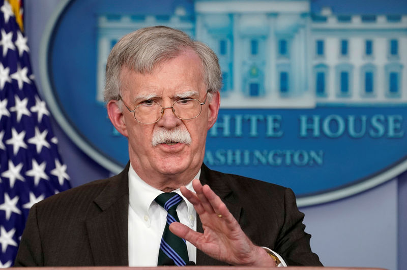 © Reuters. FILE PHOTO: Bolton speaks during a press briefing at the White House in Washington