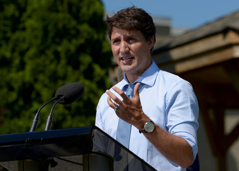Canada's Trudeau, star dimmed by scandals, kicks off tough re-election campaign