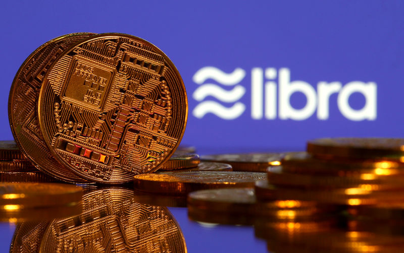 © Reuters. FILE PHOTO: Representations of virtual currency and Libra logo illustration picture