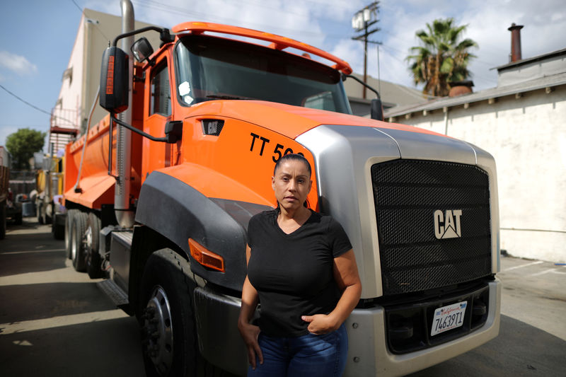 © Reuters. Sandra Alzate, 51, vice president of a trucking company, poses for a portrait in Los Angeles